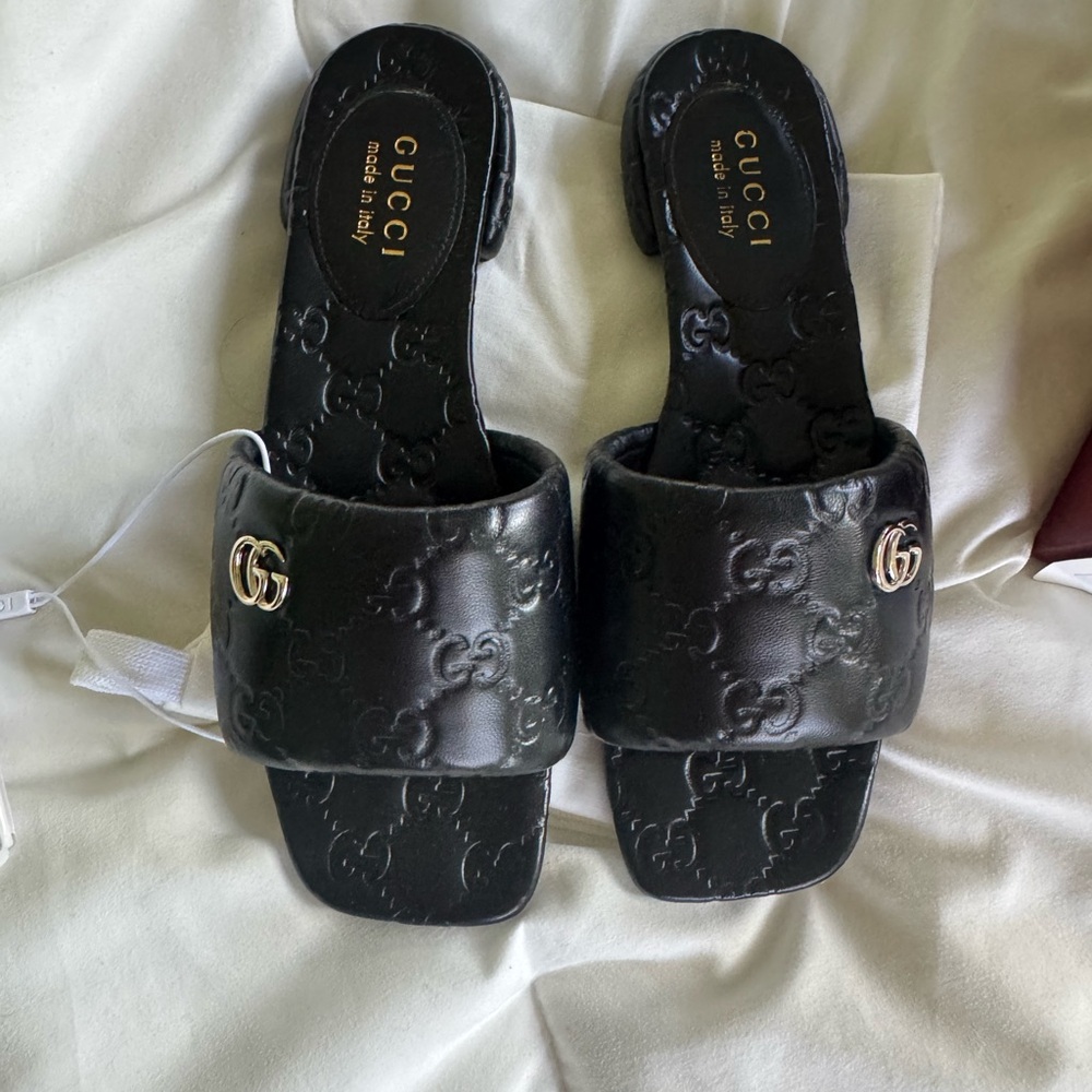 Gucci Black GG Embossed Leather Slide Mules with Gold Double G